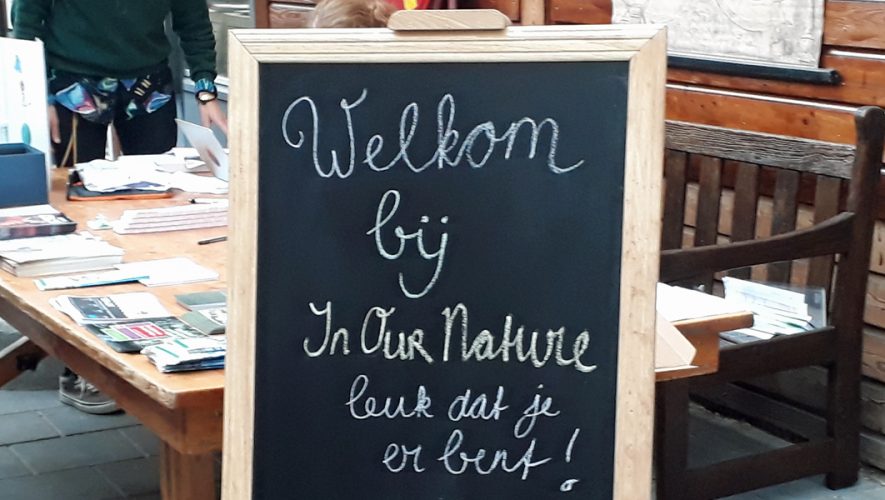 In Our Nature festival welkomstbord