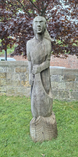 Wooden sculpture of Kupe in the South Seas garden, Pannet Park, Whitby
